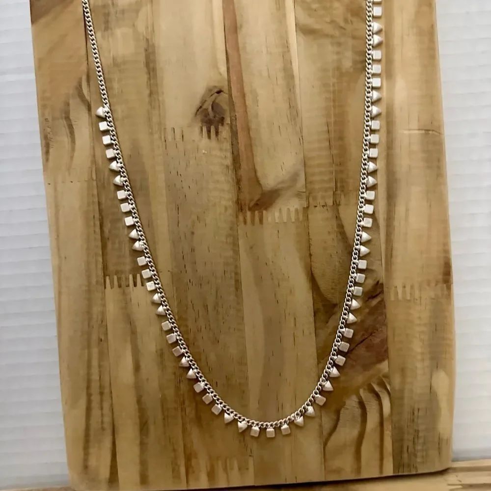 Silver tone drop necklace